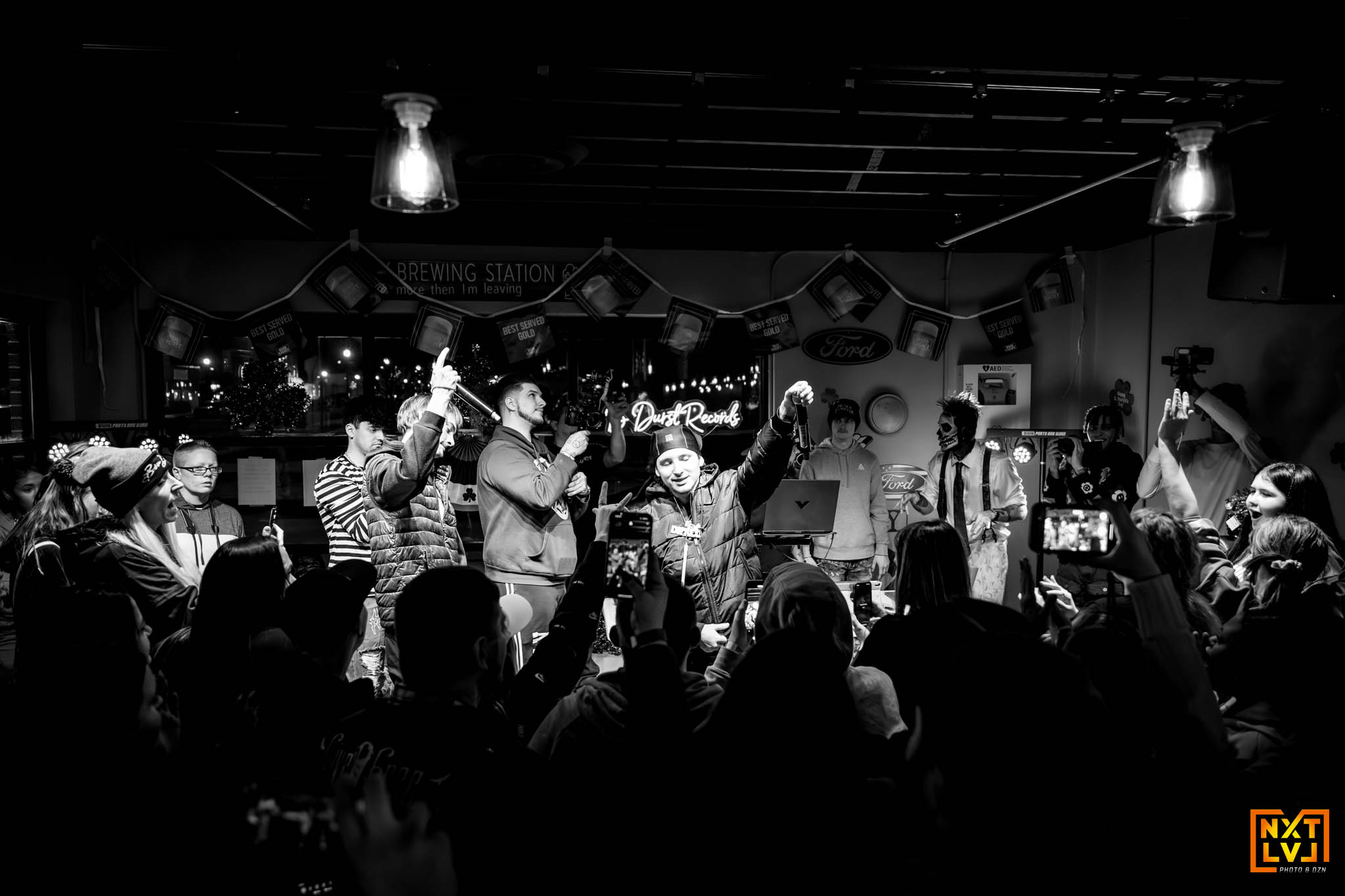 Black and white HAKYHM performance with crowd